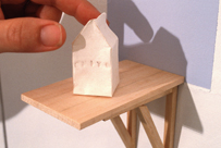 Tiny White House With "Chiyo" Stamped Onto It